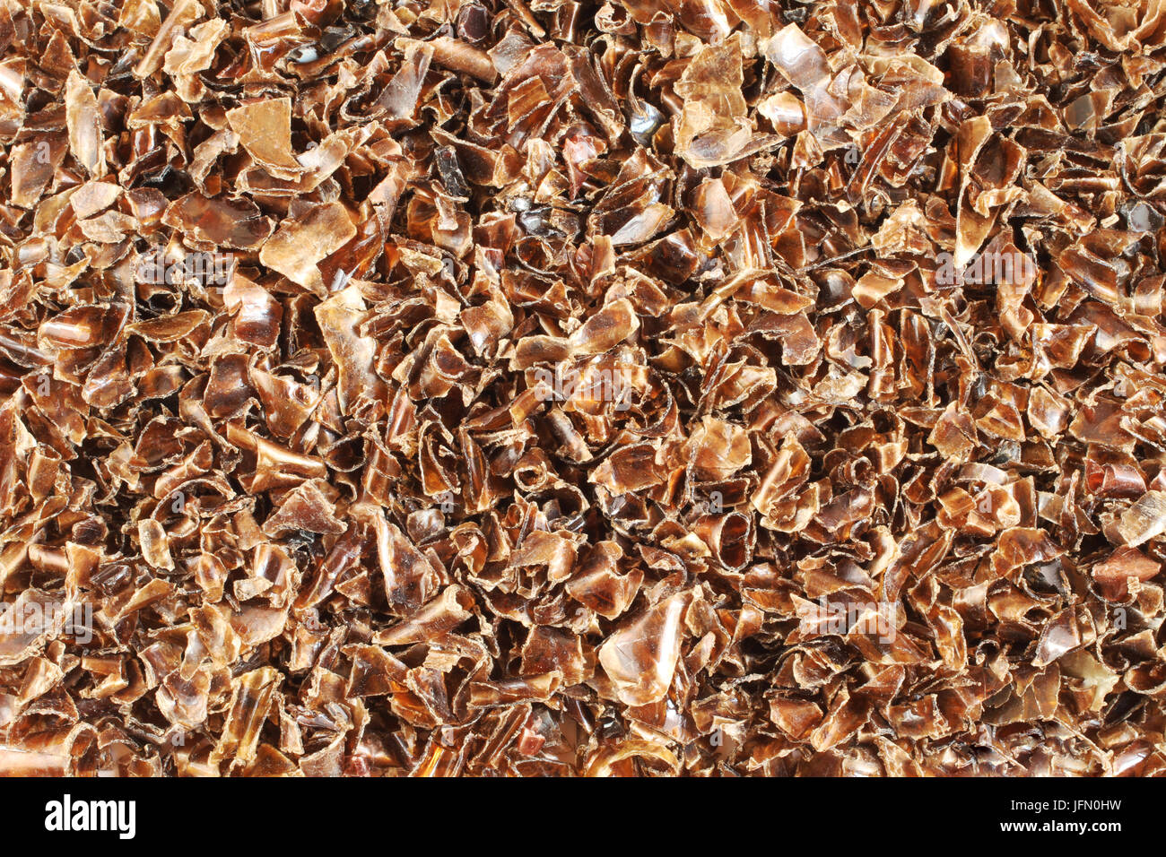 Small pieces of cut brown plastic bottles Stock Photo Alamy