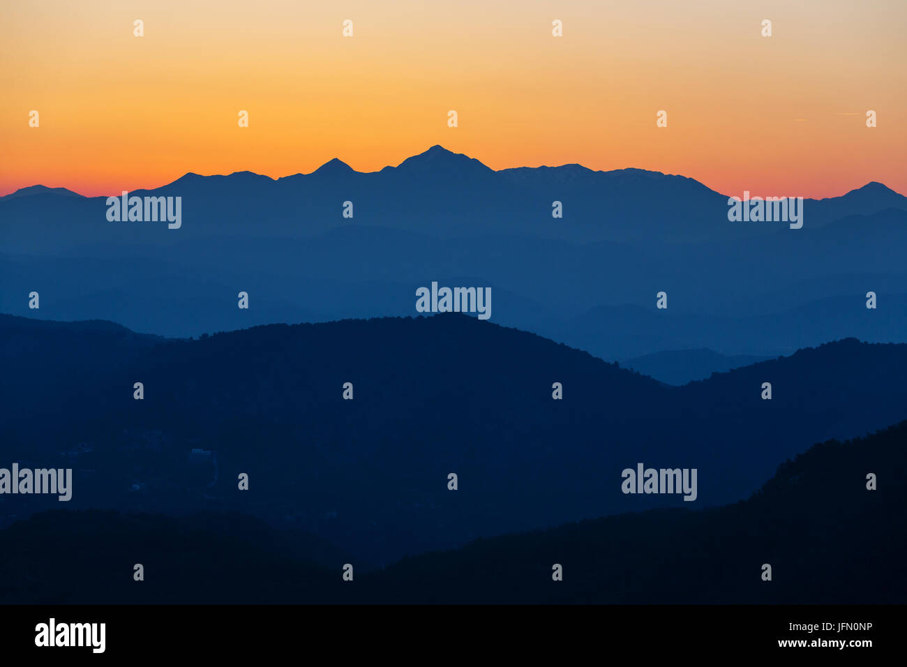 Mountains on sunset Stock Photo - Alamy