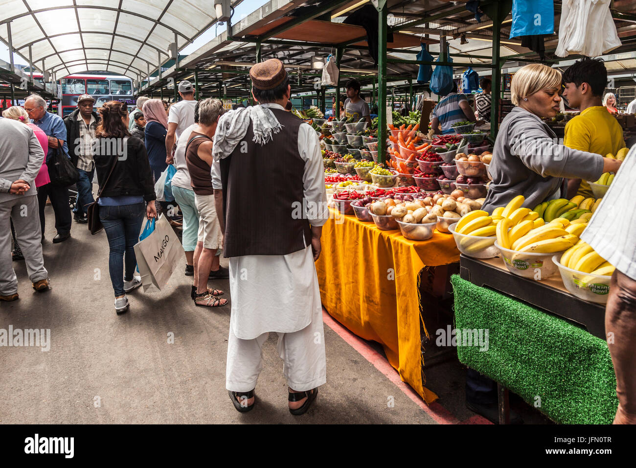 Customers and vendors in the Bullring Markets in central Birmingham