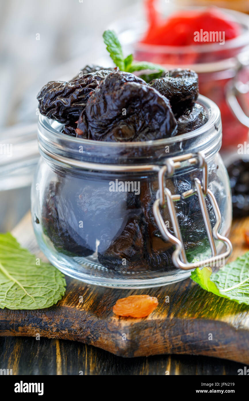 Dried prunes in a glass jar Stock Photo Alamy