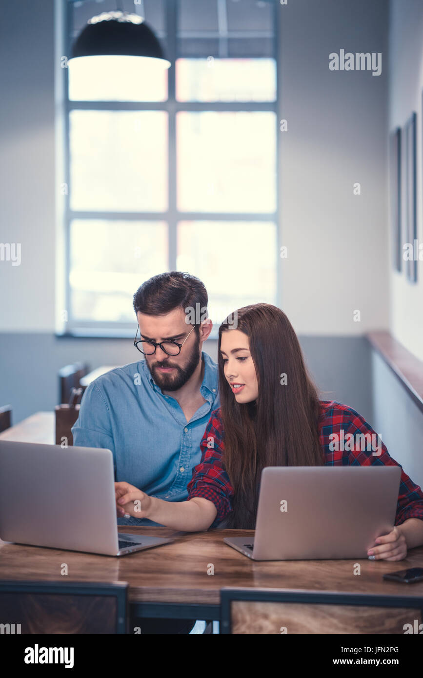 Hipsters with laptop Stock Photo