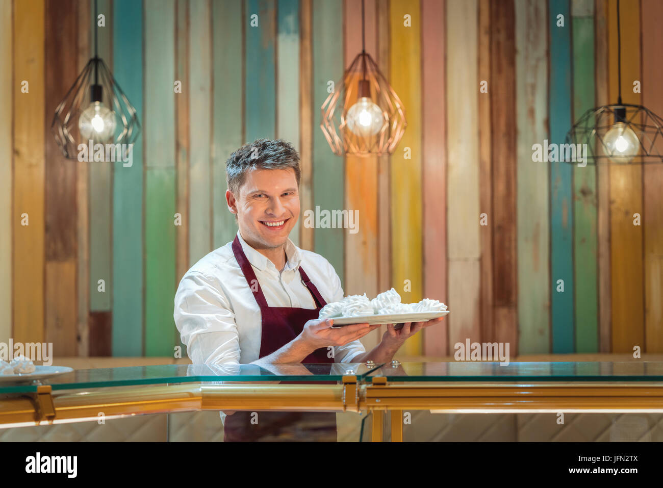 Owner smiling hi-res stock photography and images - Alamy