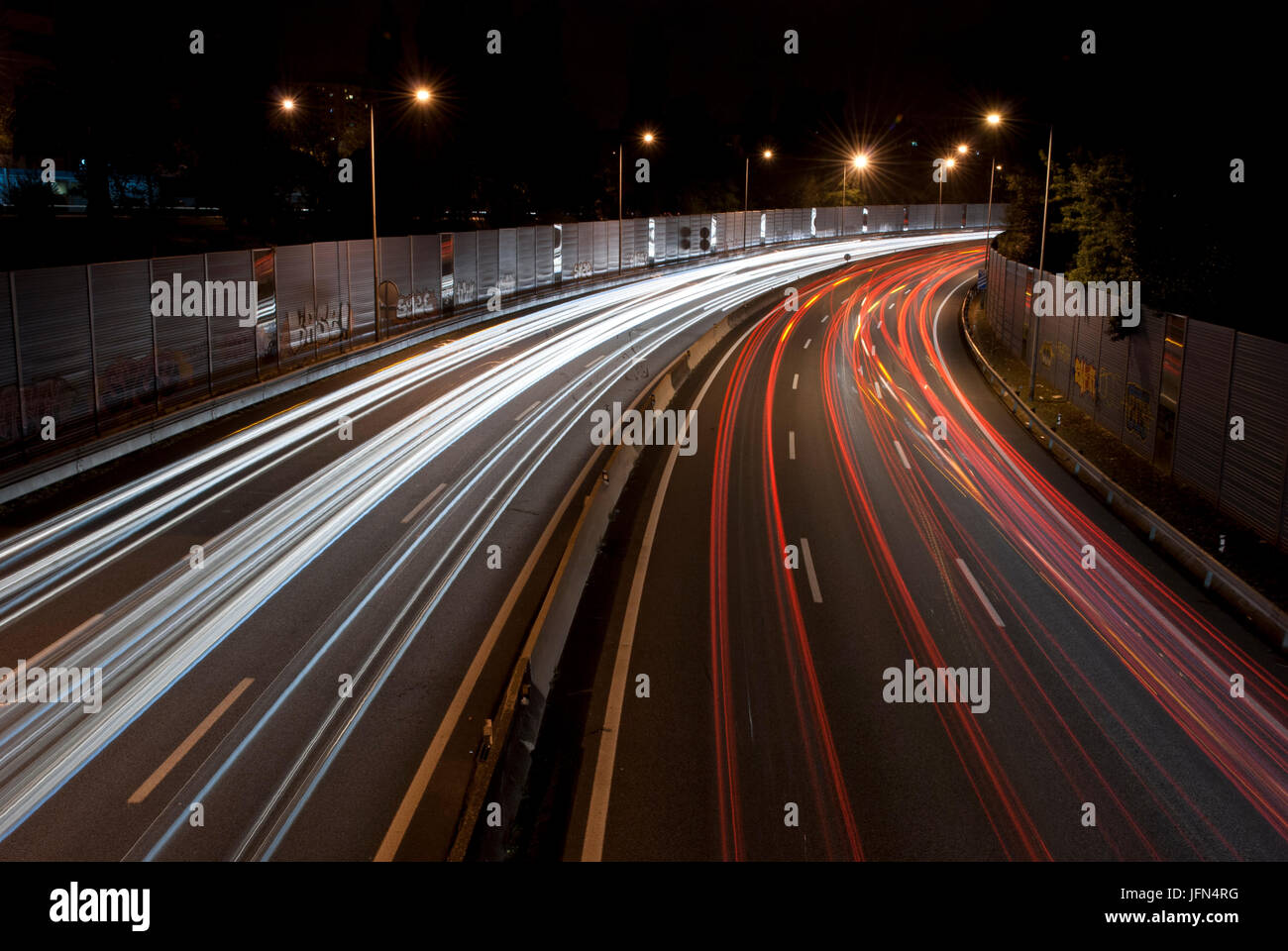 Long exposure of traffic on highway at night Stock Photo - Alamy