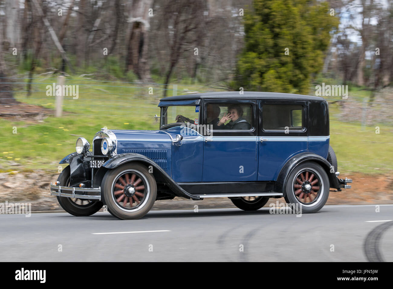 Vintage 1929 Essex Challenger Sedan driving on country roads near the town of Birdwood, South Australia. Stock Photo