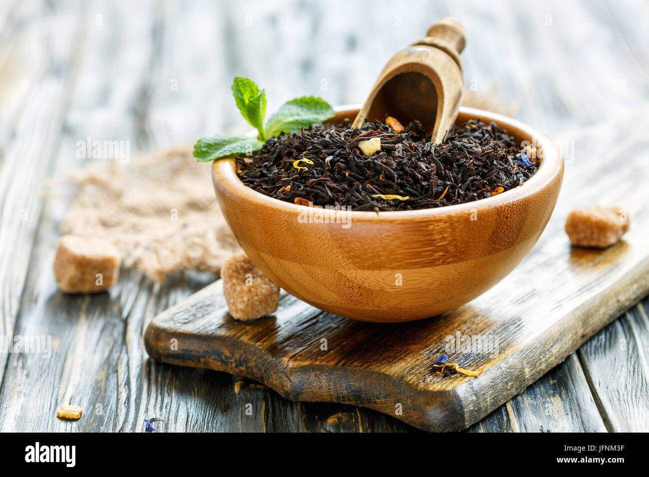 Black tea with bergamot in a bowl and cane sugar Stock Photo Alamy