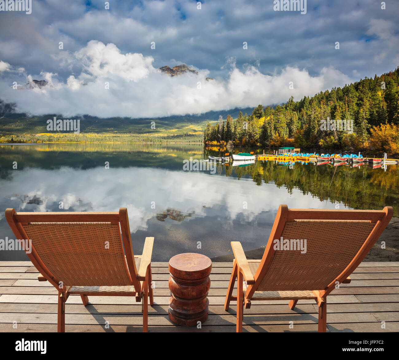 Two wooden chaise lounges Stock Photo