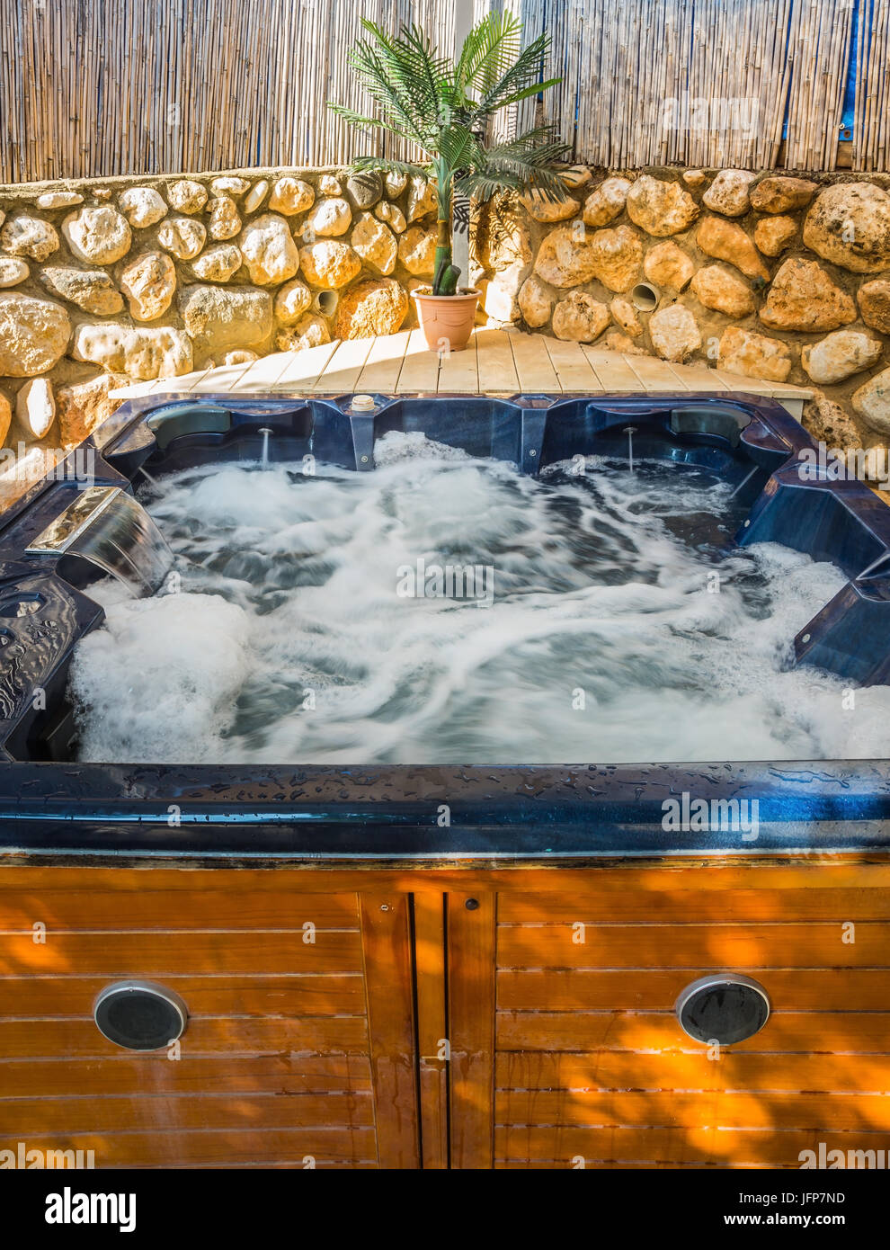 Bath Jacuzzi in the garden Stock Photo Alamy