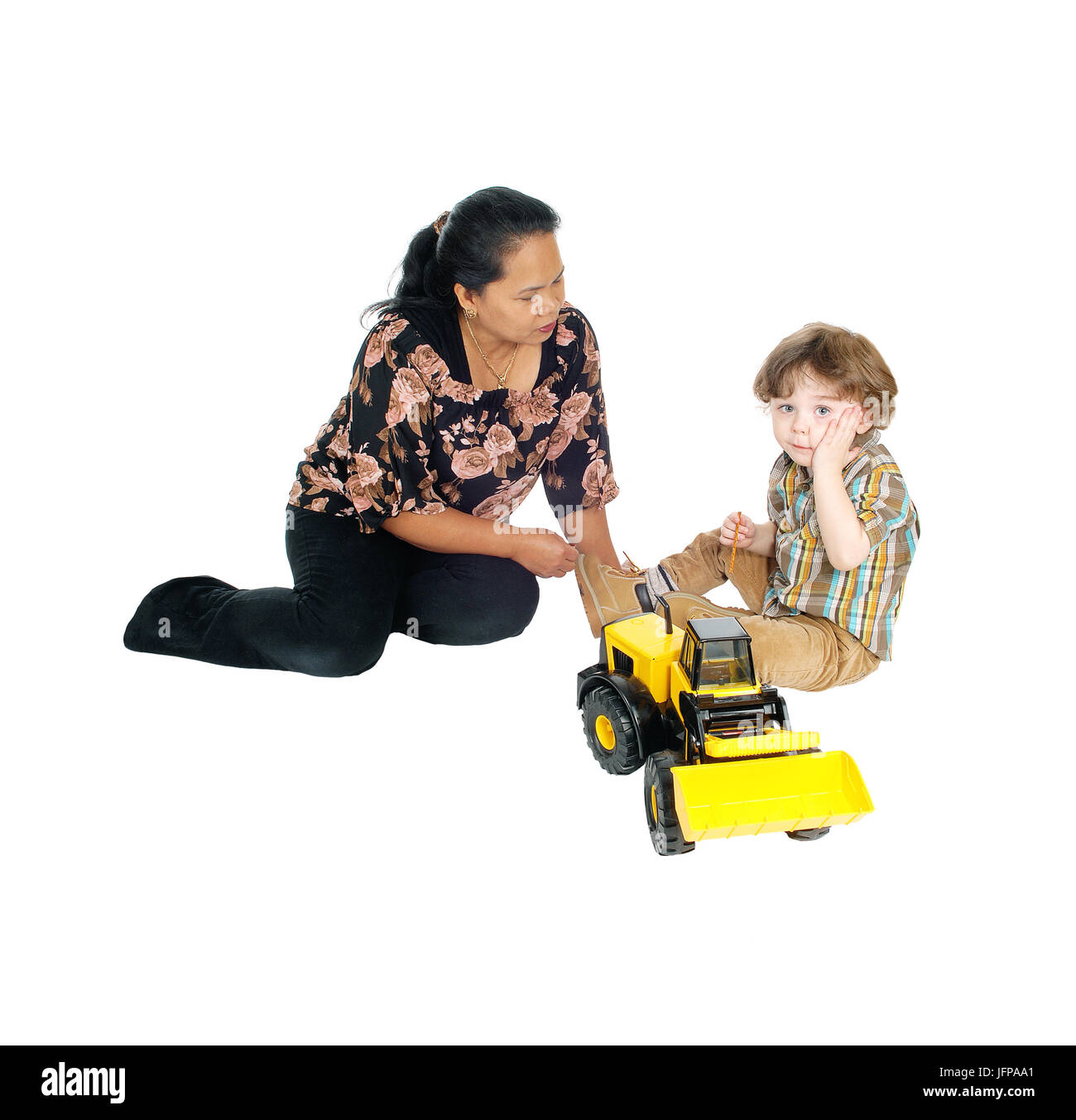 Nanny plays with little boy. Stock Photo