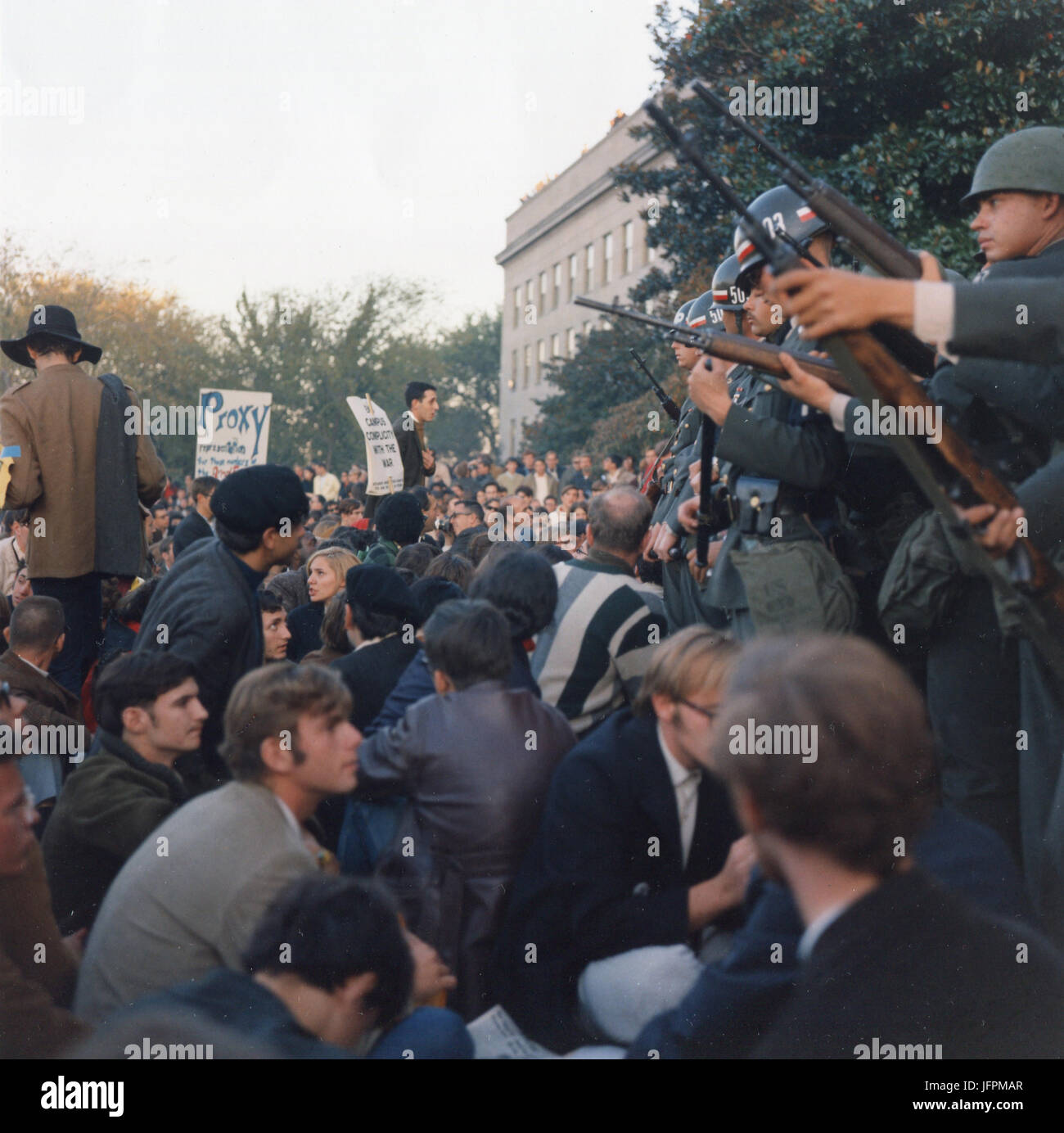 Members of the Military Police keep back protestors during their sit-in at the Mall entrance to the Pentagon. Washington, DC, Oct 11, 1967. Stock Photo