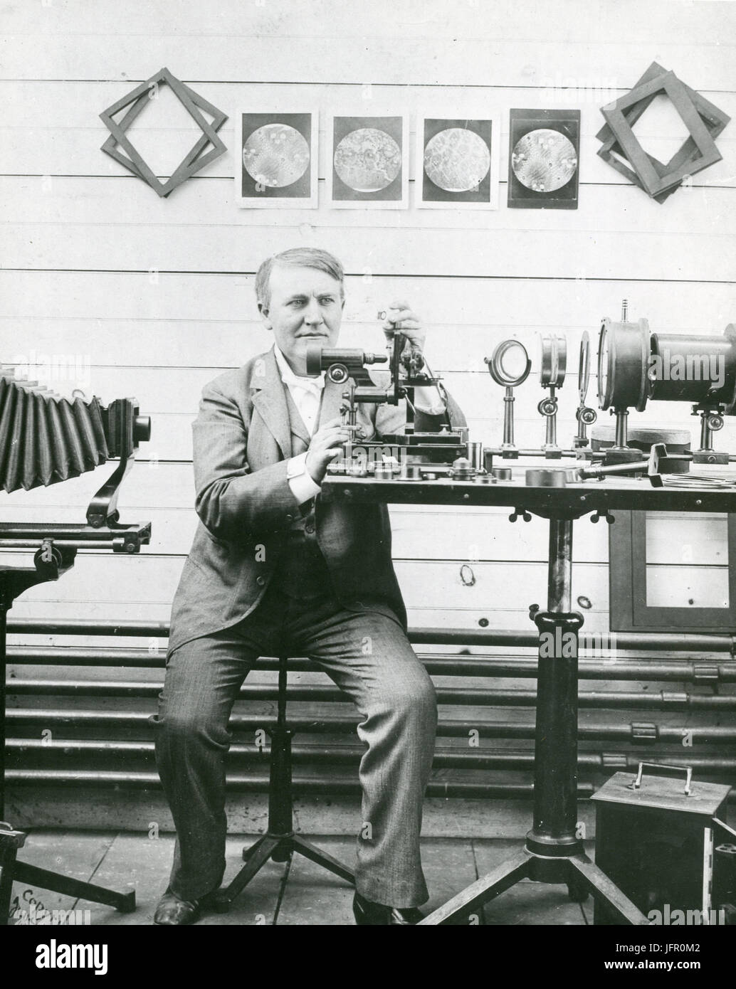 Thomas Alva Edison is shown in his laboratory experimenting with micrography, New Jersey. Stock Photo