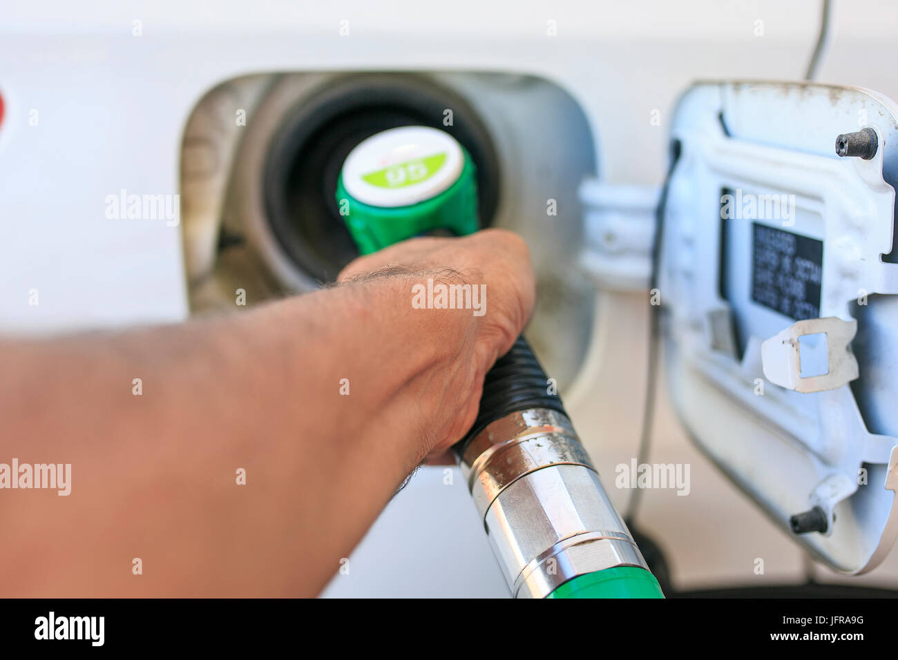 Man refilling his gasoline car Stock Photo Alamy
