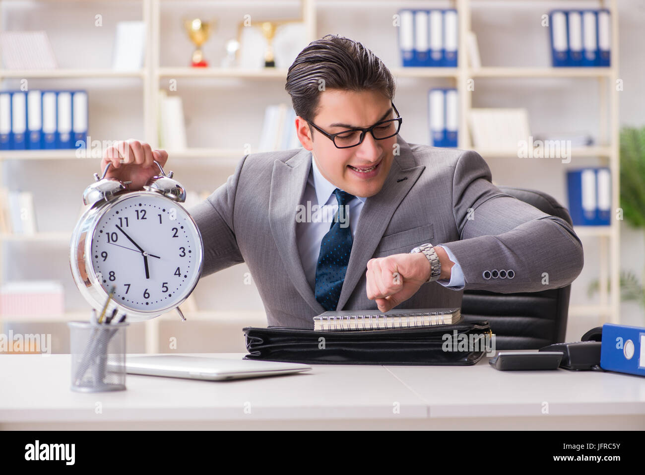 The businessman rushing in the office Stock Photo