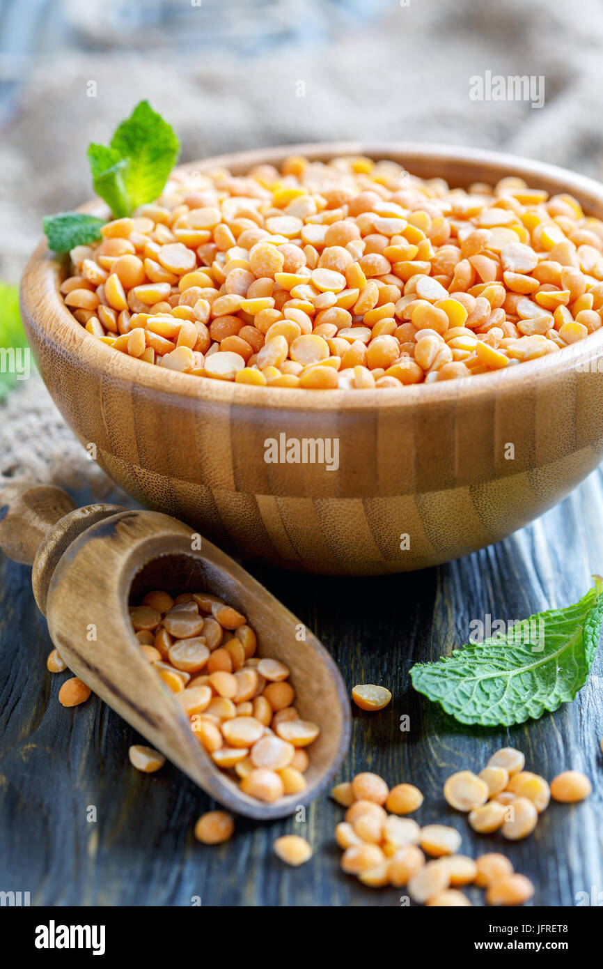 Bowl of dry yellow peas close up. Stock Photo