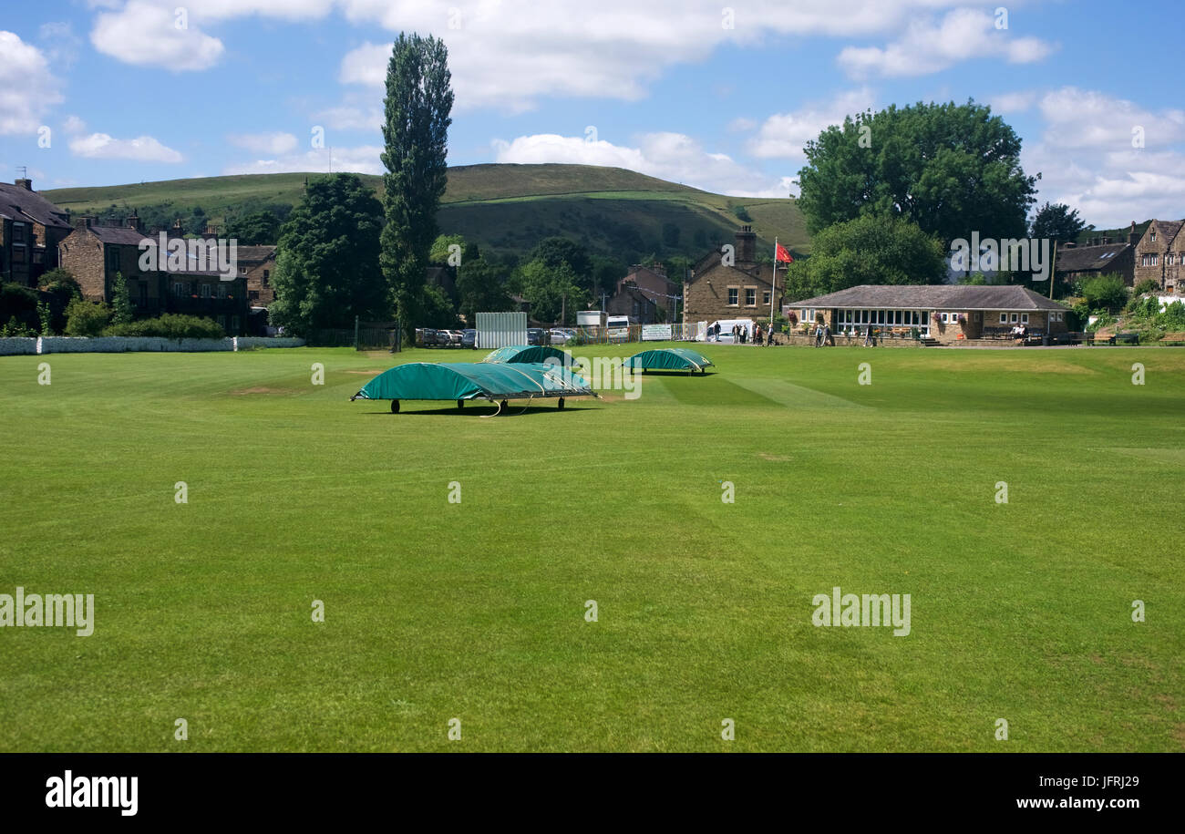 Hayfield Cricket Ground with Lantern Pike in the background Stock Photo