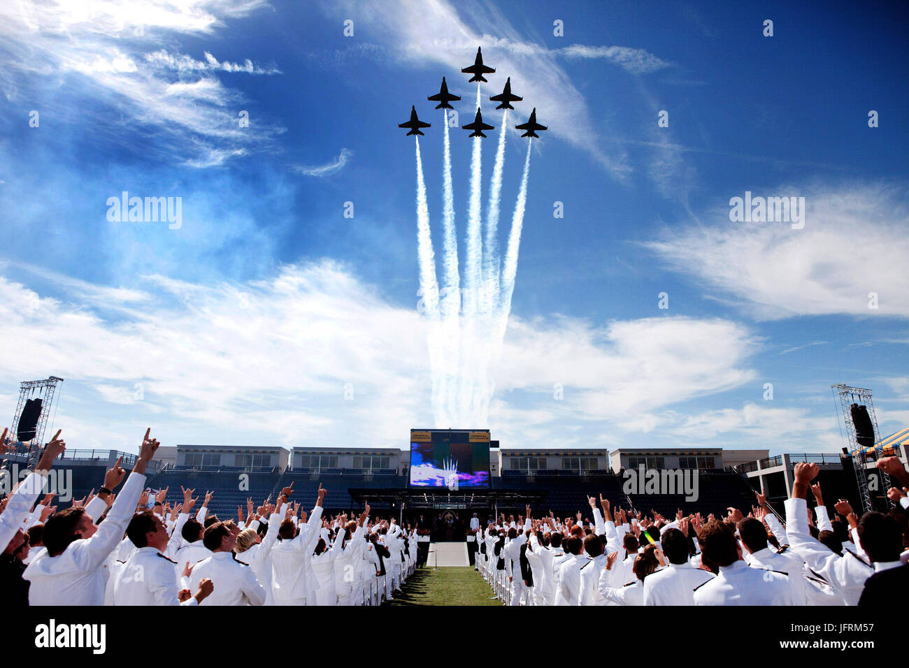 The United States Navy's 'Blue Angels' fly over the Naval Academy's 2009 commencement ceremony in Delta Formation in Annapolis, Md., May 22, 2009. (Official White House Photo by Lawrence Jackson)  This official White House photograph is being made available for publication by news organizations and/or for personal use printing by the subject(s) of the photograph. The photograph may not be manipulated in any way or used in materials, advertisements, products, or promotions that in any way suggest approval or endorsement of the President, the First Family, or the White House. Stock Photo