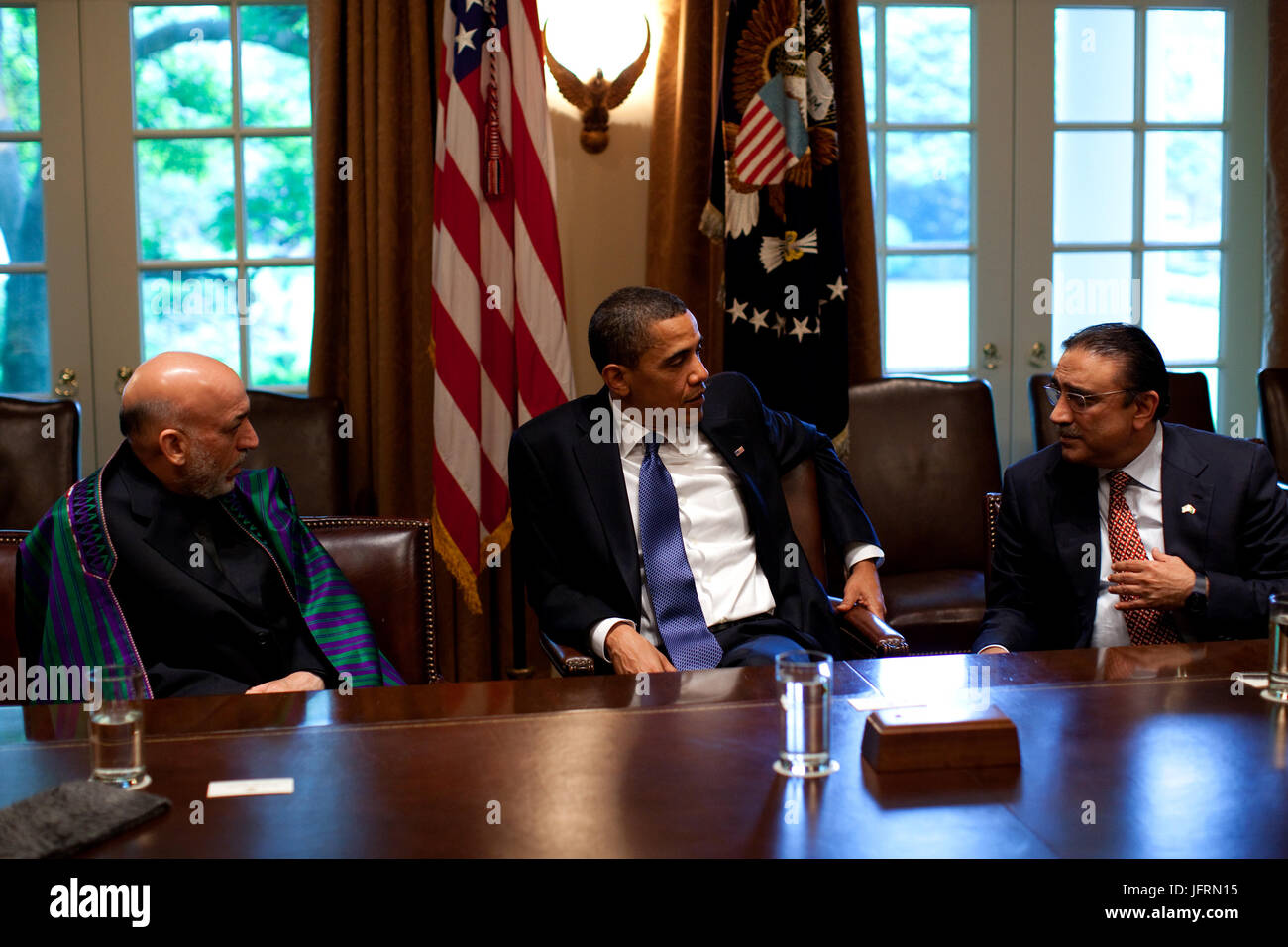 President Barack Obama (center) with Afghan President Karzai and Pakistan President Zardari during a US-Afghan-PakistanTrilateral meeting in Cabinet Room  May 6, 2009. Official White House Photo by Pete Souza Stock Photo