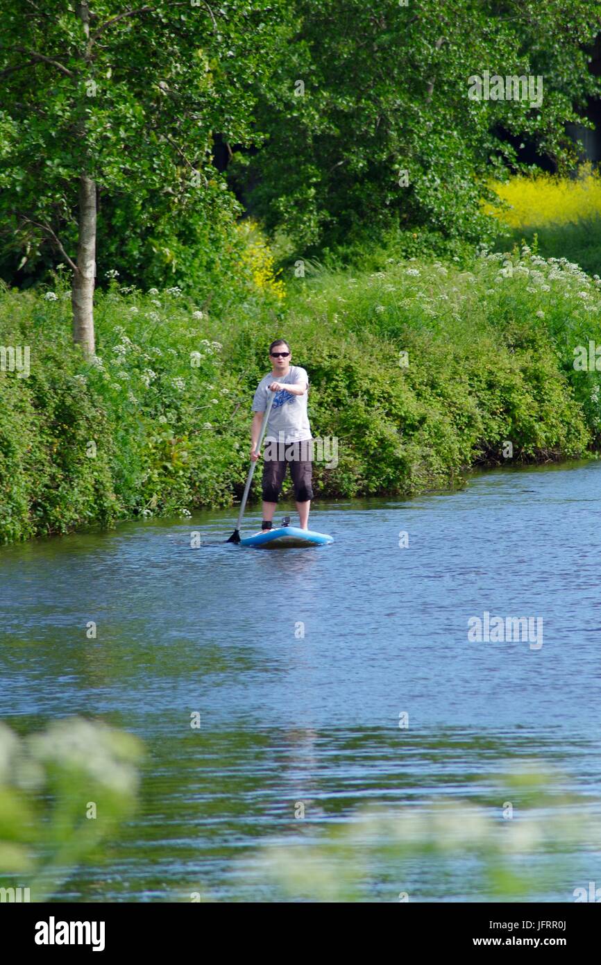 Paddle Boarder on the Exeter Ship Canal. Devon, UK. May, 2017 Stock