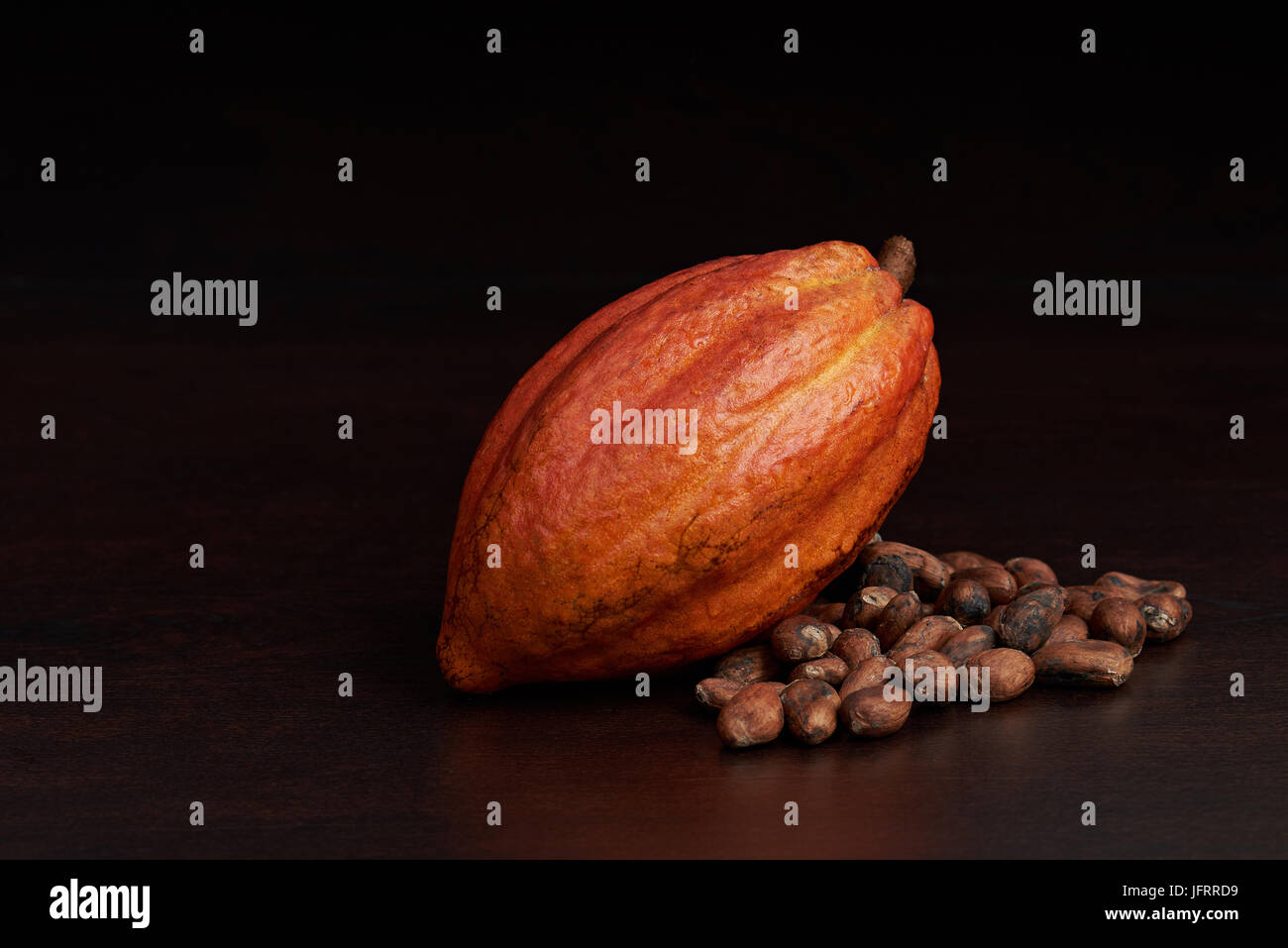 Organic raw cacao pod fruit. Chocolate production theme Stock Photo Alamy