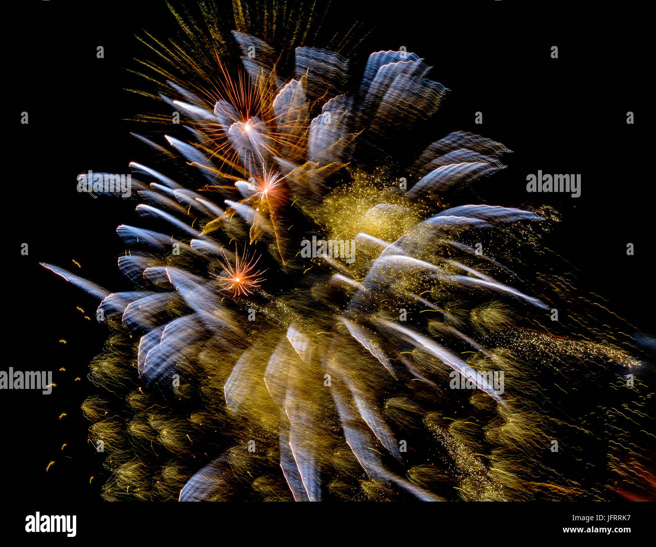 Firework in yellow and blue on black background in graphical color painting style Stock Photo
