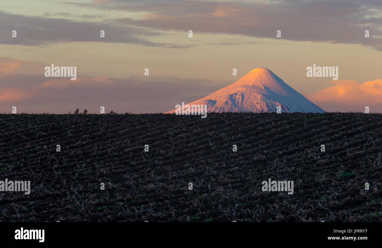 Sunset in the Osorno volcano ÷ Atardecer en el volcán Osorno Stock Photo