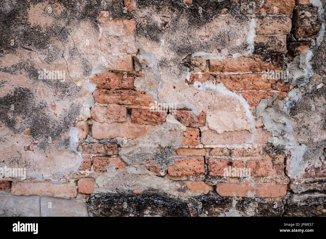 Old brick wall texture in a background image Stock Photo - Alamy