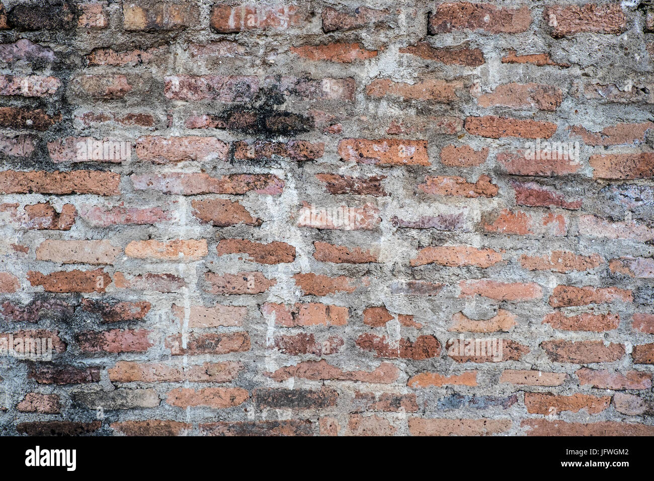 Old brick wall texture in a background image Stock Photo - Alamy