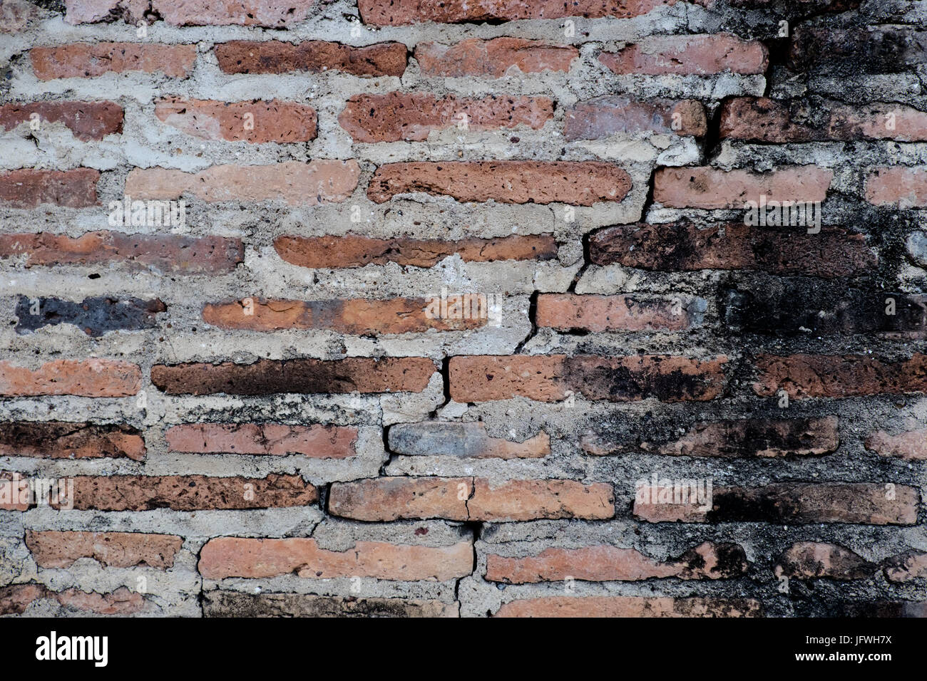 Old brick wall texture in a background image Stock Photo - Alamy