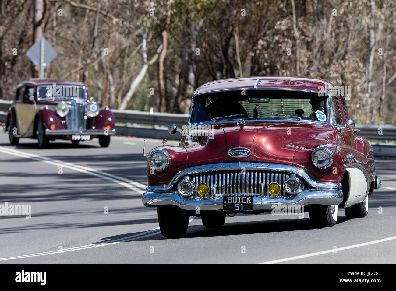 Vintage 1951 Buick Super Sedan driving on country roads near the town of Birdwood, South Australia. Stock Photo