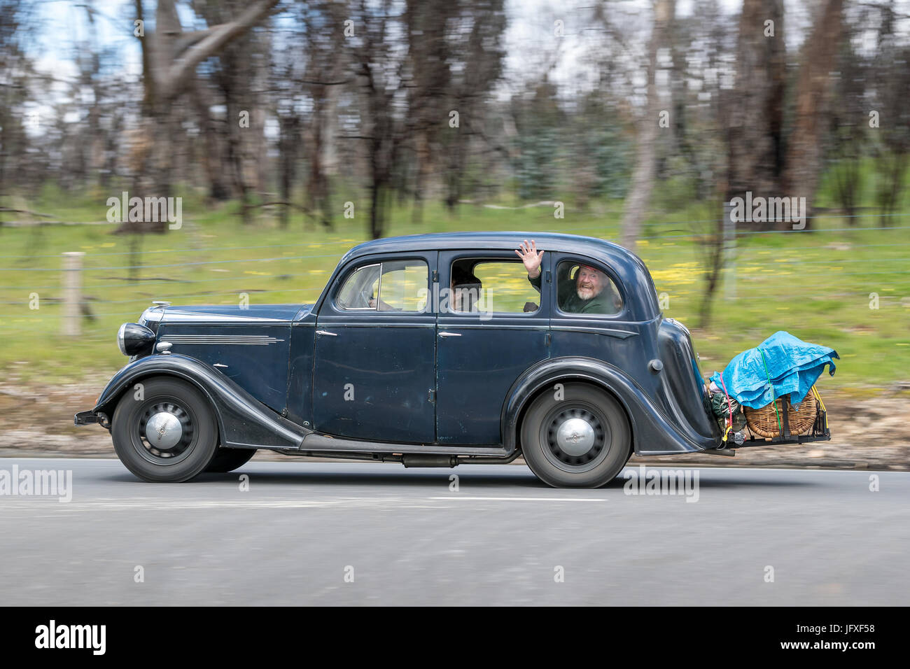 Vintage 1937 Vauxhall DX Saloon driving on country roads near the town of Birdwood, South Australia. Stock Photo