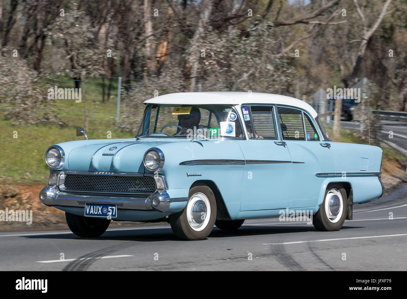Vintage 1957 Vauxhall Victor Sedan  driving on country roads near the town of Birdwood, South Australia. Stock Photo