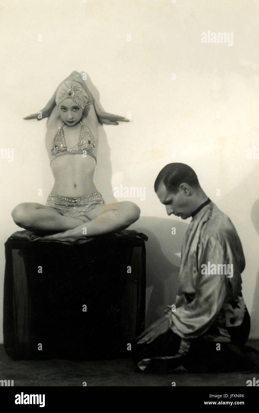 Magician artists Jutta and Silvio during a show, 1930s Stock Photo