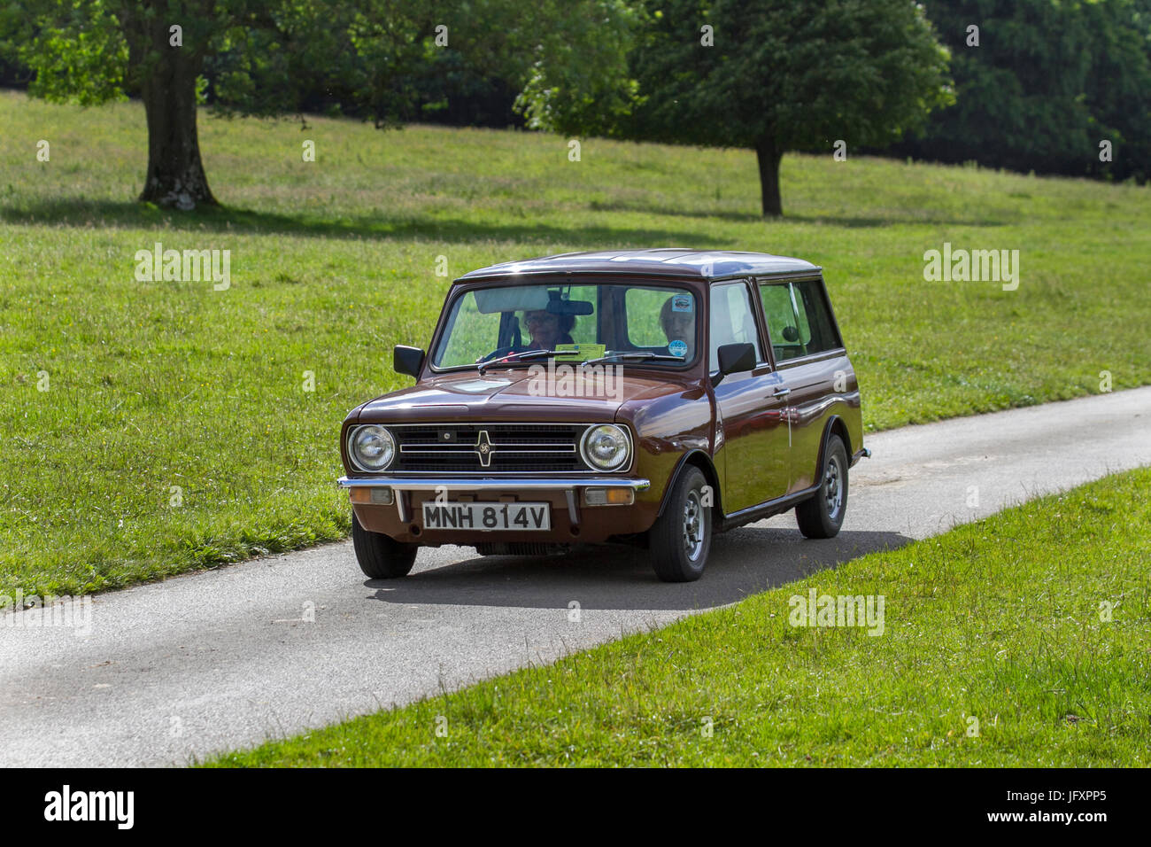 1980 80s brown Austin Morris Mini Clubman Classic, collectable restored vintage 1980s vehicles arriving for the Mark Woodward Event at Leighton Hall, Carnforth, UK Stock Photo