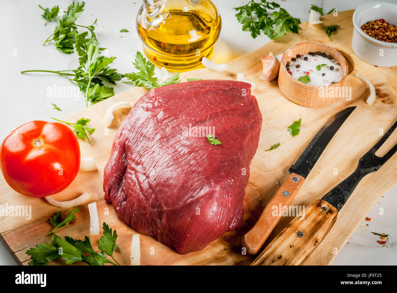 Cooking beef fillet tenderloin. Large whole piece of veal fillet on