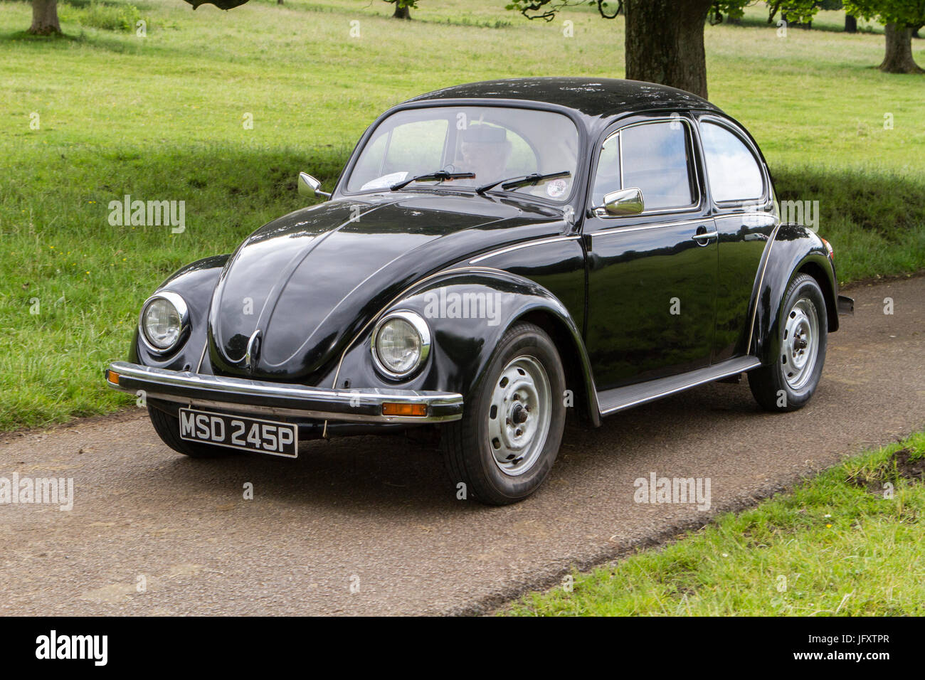 1976 70s black Vw Volkswagen Beetle 1300cc classic cars, cherished veteran, restored old timer, collectible motors, vintage heritage, old saloon. Stock Photo
