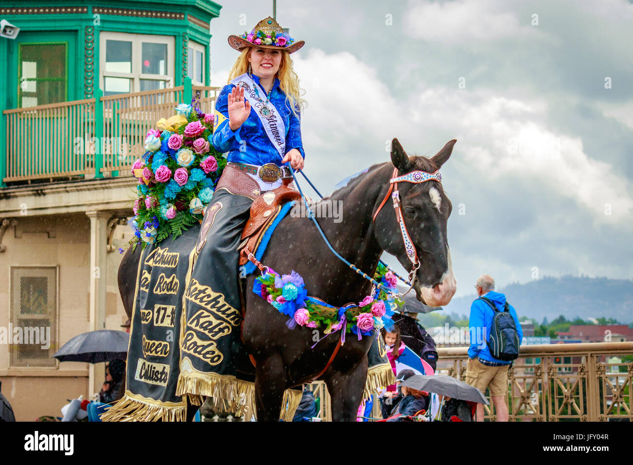 Portland, Oregon, USA - June 10, 2017: Glenwood Ketchum Kalf Rodeo Queen, Callista Howell, in the Grand Floral Parade, as it stretched through the rai Stock Photo