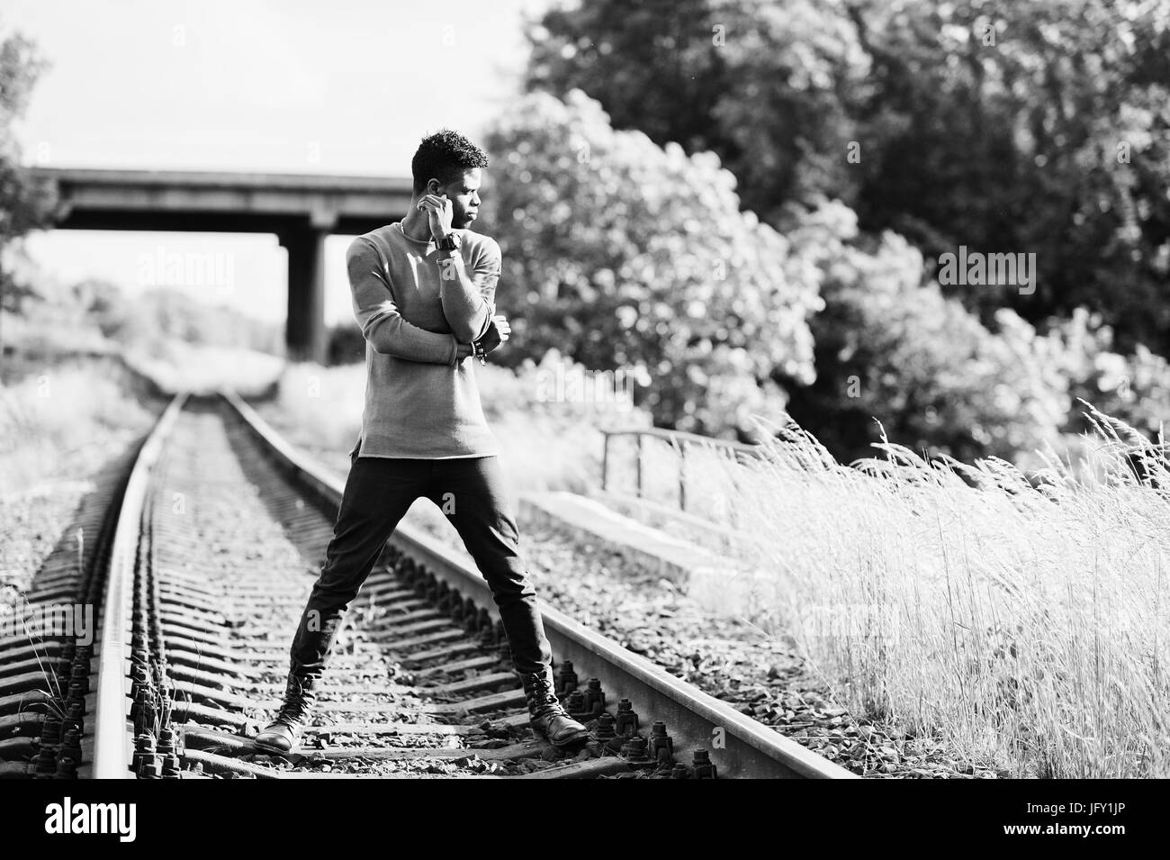 Young black african man walking Black and White Stock Photos & Images ...