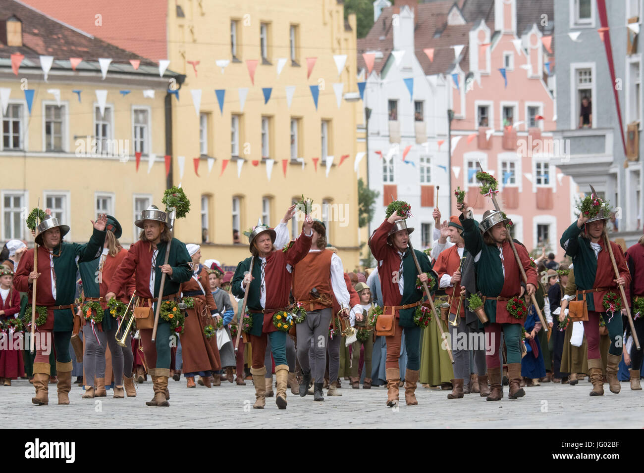 Landshut, Germany. 2nd July, 2017. People in historical costumes, photographed at the parade of the Landshut Wedding (German: 'Landshuter Hochzeit') in the old town of Landshut, Germany, 2 July 2017. The citizens of the Lower Bavarian regional capital reenact the wedding ceremony of the the son of the Duke of Bavaria, George, and the Polish King's daughter Hedwig in 1475. Photo: Armin Weigel/dpa/Alamy Live News Stock Photo