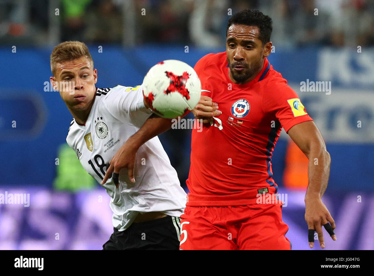 Saint Petersburg, Russia. 2nd July, 2017. Chile's Jean Beausejour (r) and Germany's Joshua Kimmich in action during the Confederations Cup finale between Chile and Germany at the Saint Petersburg Stadium in Saint Petersburg, Russia, 2 July 2017. Photo: Christian Charisius/dpa/Alamy Live News Stock Photo