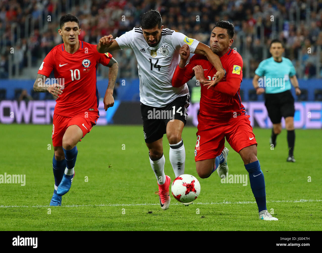 Saint Petersburg, Russia. 2nd July, 2017. Germany's Emre Can (c) and Chile's Pablo Hernandez (l) and Gonzalo Jara in action during the Confederations Cup finale between Chile and Germany at the Saint Petersburg Stadium in Saint Petersburg, Russia, 2 July 2017. Photo: Christian Charisius/dpa/Alamy Live News Stock Photo