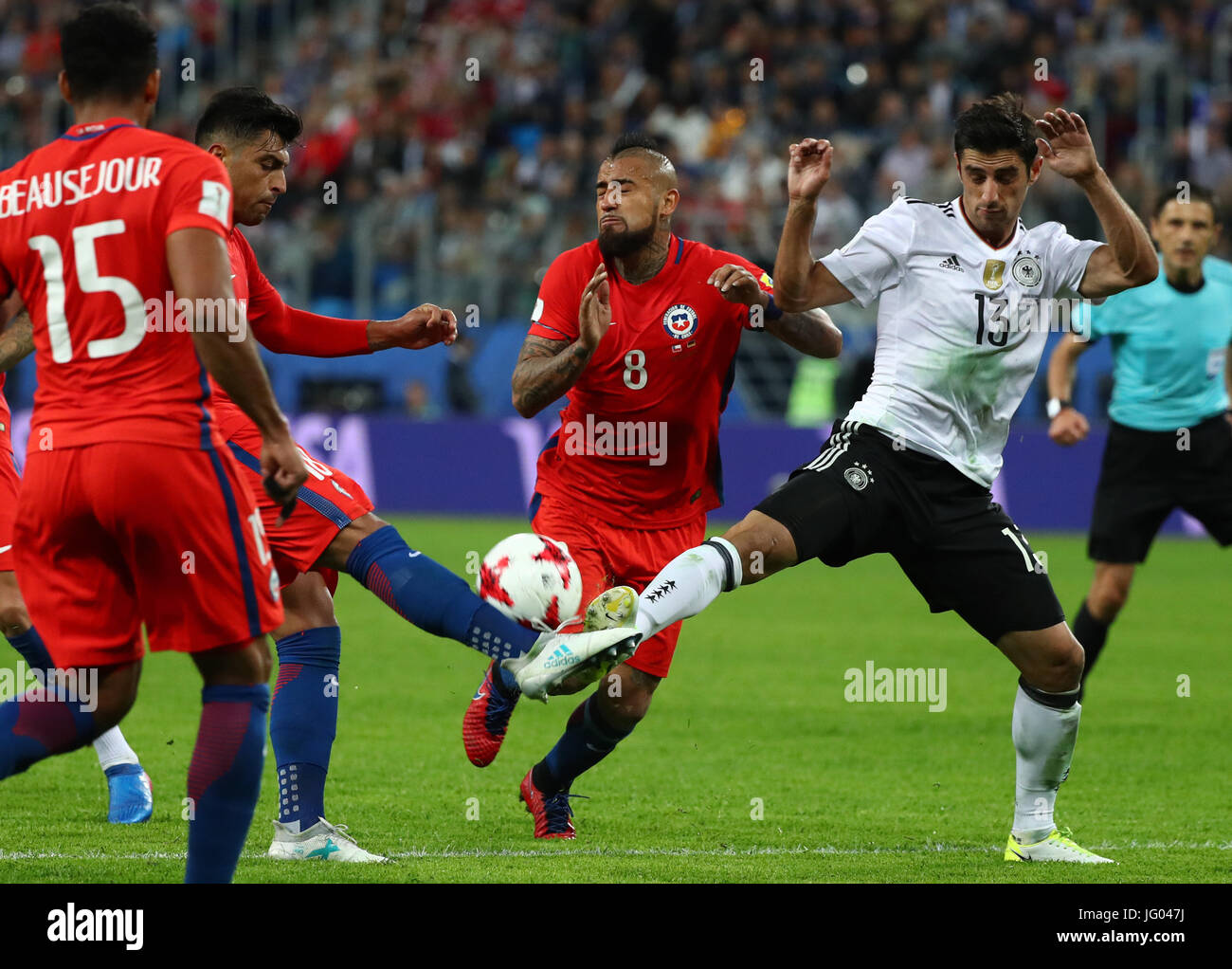 Saint Petersburg, Russia. 2nd July, 2017. Chile's Gonzalo Jara and Arturo Vidal (c) and Germany's Lars Stindl in action during the Confederations Cup finale between Chile and Germany at the Saint Petersburg Stadium in Saint Petersburg, Russia, 2 July 2017. Photo: Christian Charisius/dpa/Alamy Live News Stock Photo