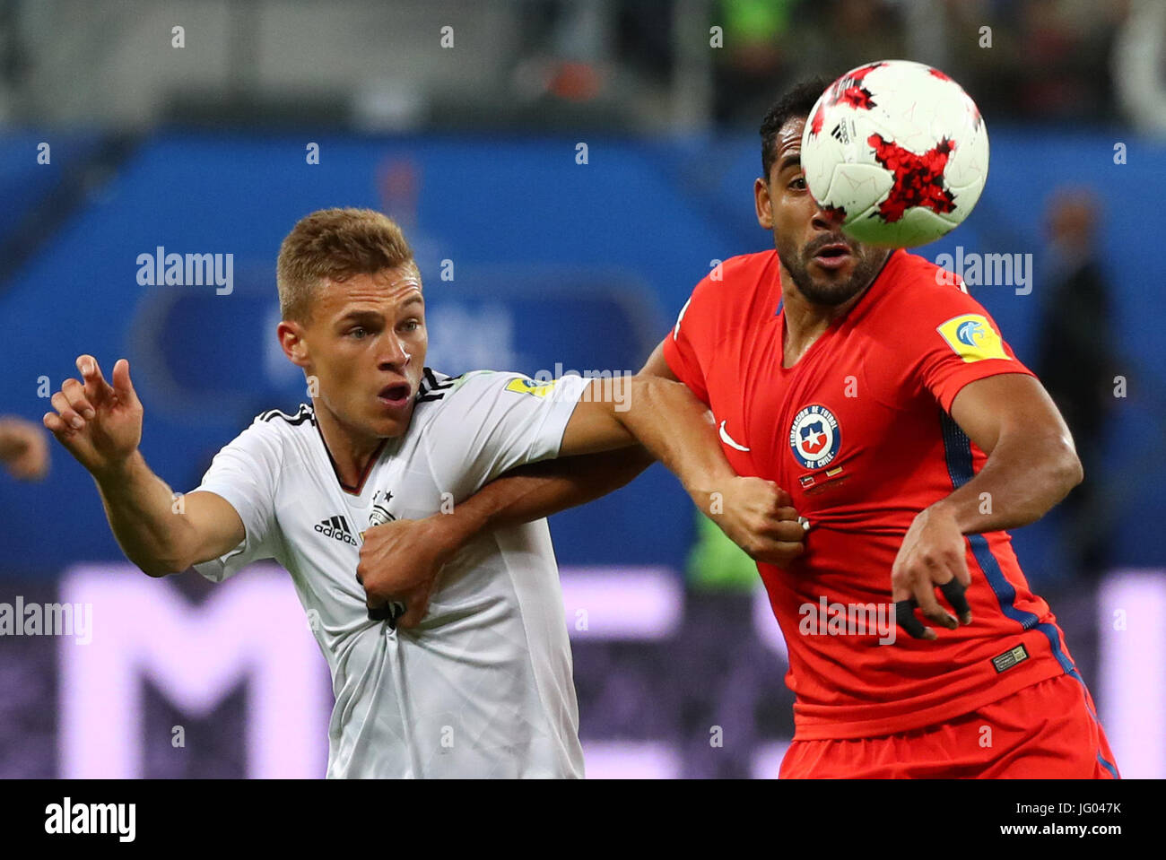 Saint Petersburg, Russia. 2nd July, 2017. Chile's Jean Beausejour (r) and Germany's Joshua Kimmich in action during the Confederations Cup finale between Chile and Germany at the Saint Petersburg Stadium in Saint Petersburg, Russia, 2 July 2017. Photo: Christian Charisius/dpa/Alamy Live News Stock Photo