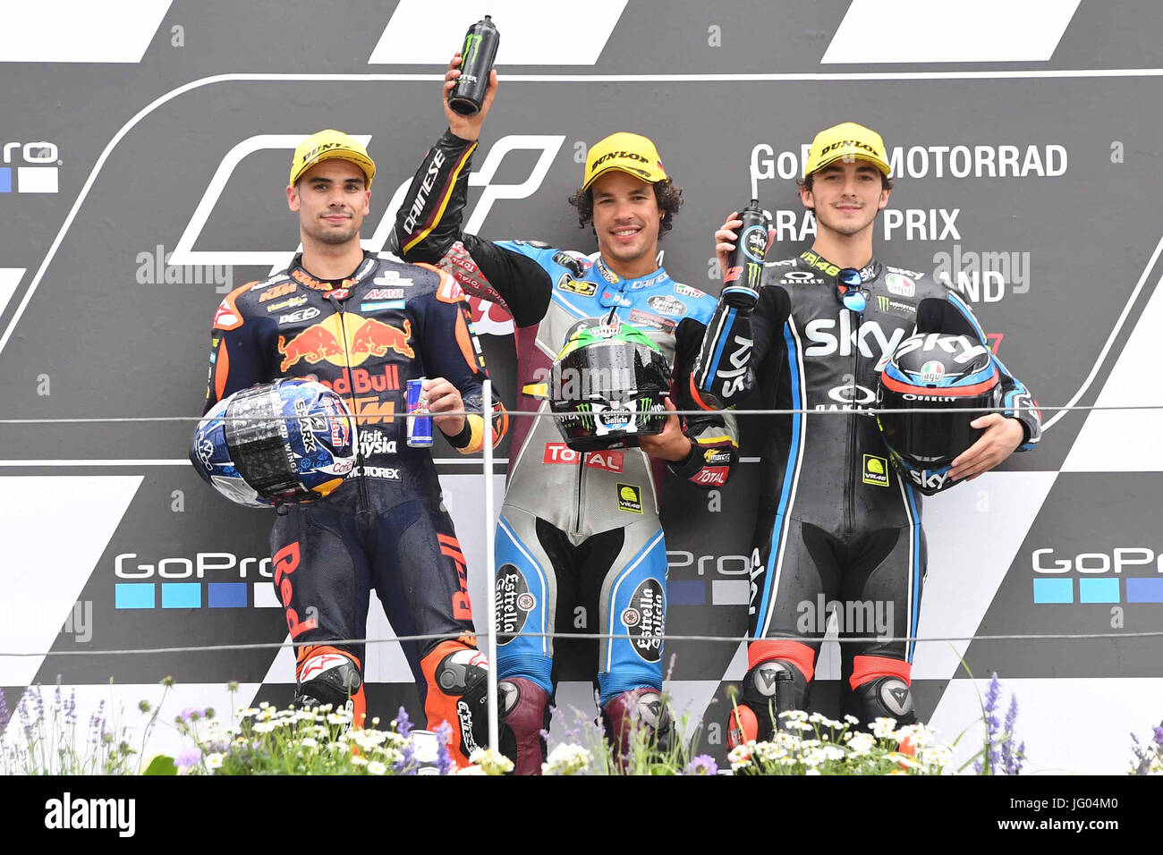 Hohstein-Ernstthal, Germany. 2nd July, 2017. (L-R) Miguel Oliveira of Portugal and Red Bull KTM Ajo, Franco Morbidelli of Italy and EG 00 Marc VDS and Francesco Bagnaia of Italy and Sky Racing Team VR46 celebrates on the podium at the end of the Moto2 race during the MotoGp of Germany - Race at Sachsenring Circuit on July 2, 2017 in Hohenstein-Ernstthal, Germany. Credit: marco iorio/Alamy Live News Stock Photo