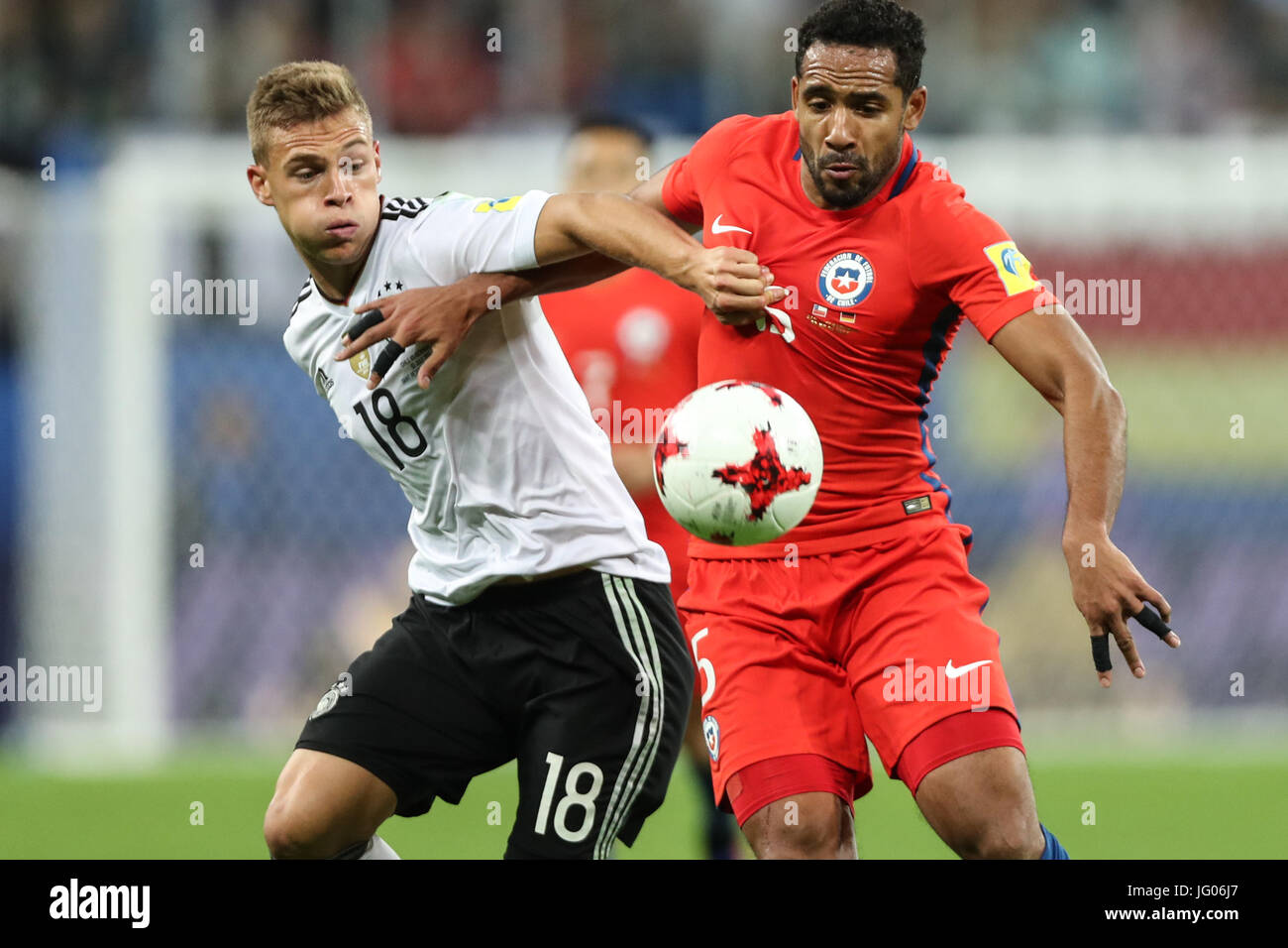 St. Petersburg, Russia. 2nd July, 2017. Joshua Kimmich (L) of Germany competes with Jean Beausejour of Chile during the final match between Chile and Germany at the 2017 FIFA Confederations Cup in St. Petersburg, Russia, on July 2, 2017. Germany claimed the title by defeating Chile with 1-0. Credit: Wu Zhuang/Xinhua/Alamy Live News Stock Photo
