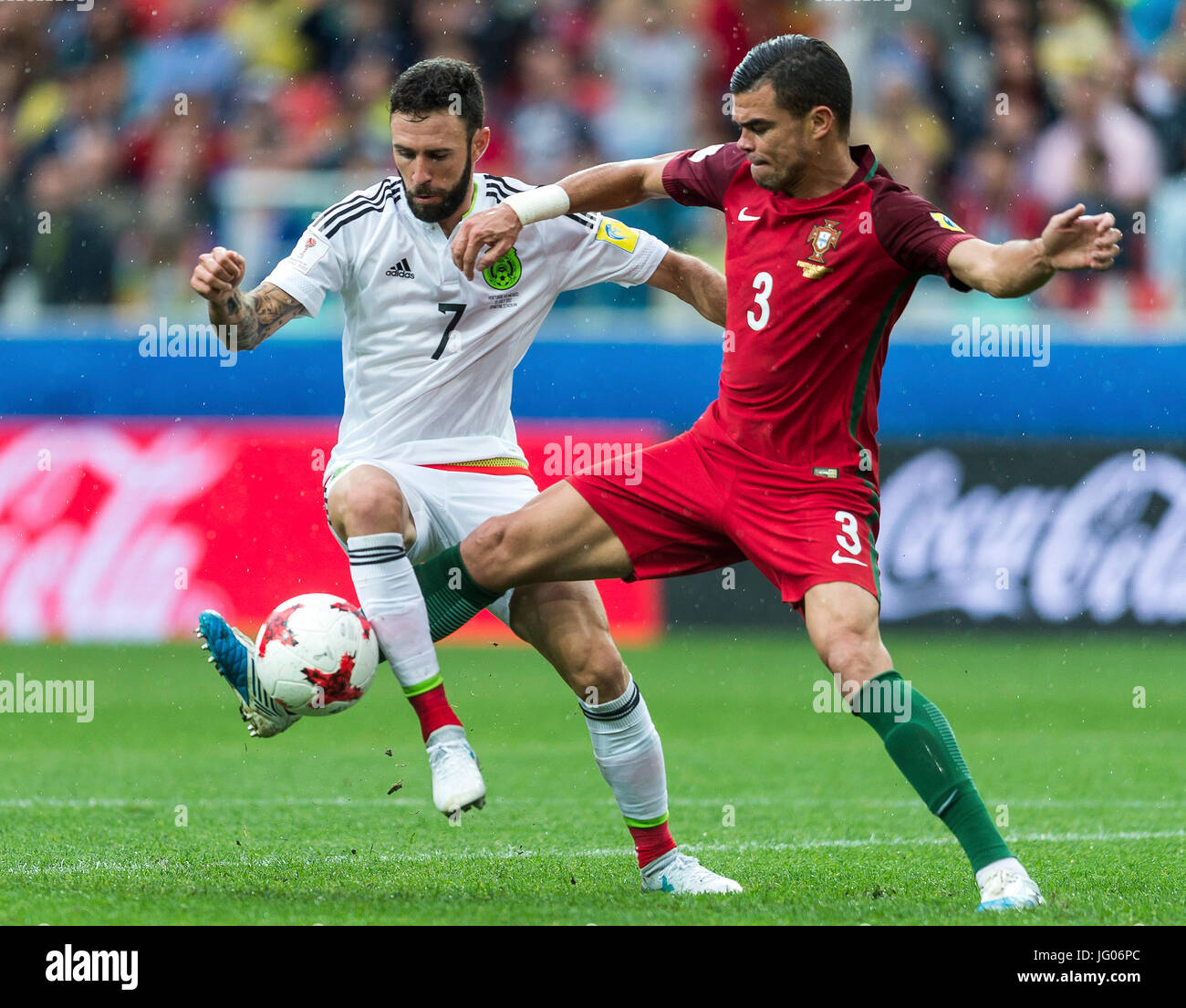 Moscow, Russia. 2nd July, 2017. Pepe (R) of Portugal vies with Miguel Layun of Mexico during the match for 3rd place between Portugal and Mexico at the 2017 FIFA Confederations Cup in Moscow, Russia, on July 2, 2017. Portugal won 2-1. Credit: Evgeny SInitsyn/Xinhua/Alamy Live News Stock Photo
