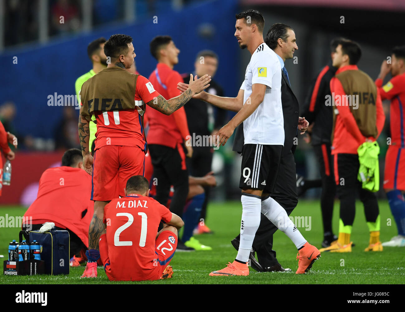 Saint Petersburg, Russia. 2nd July, 2017. Germany's Sandro Wagner (L) shakes hands with Chile's Eduardo Vargas after the Confederations Cup finale between Chile and Germany at the Saint Petersburg Stadium in Saint Petersburg, Russia, 2 July 2017. Photo: Marius Becker/dpa/Alamy Live News Stock Photo