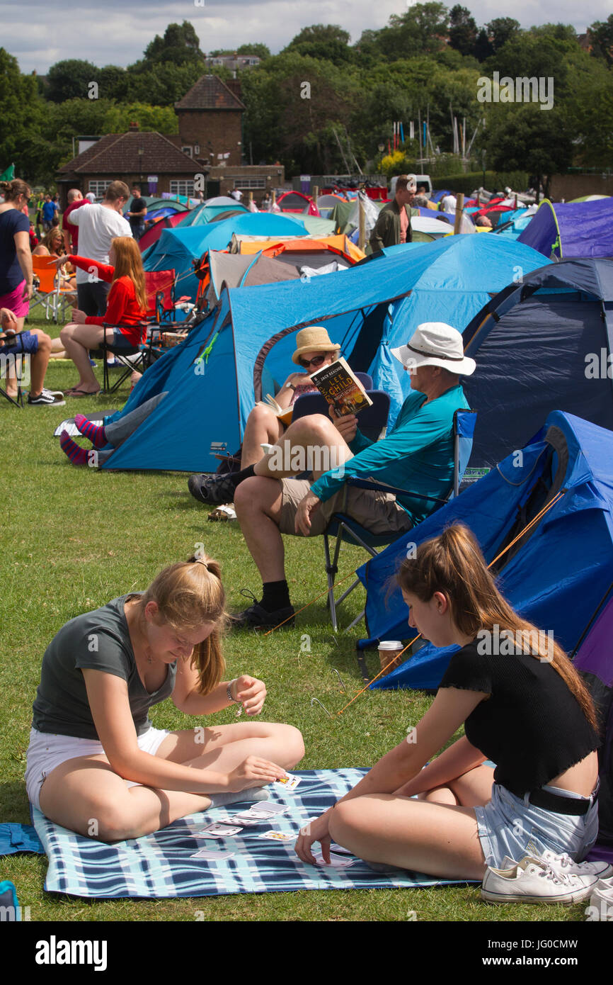 London, UK. 3rd Jul, 2017. Wimbledon Tennis Championships 2017, Wimbledon Lawn Tennis Club, Southwest London, England, UK. 03rd July, 2017. People queue up in the traditional camping lines on Wimbledon Park to get tickets for the following days Wimbledon Tennis Championships 2017 on the main Centre Court and Court One. Credit: Clickpics/Alamy Live News Stock Photo