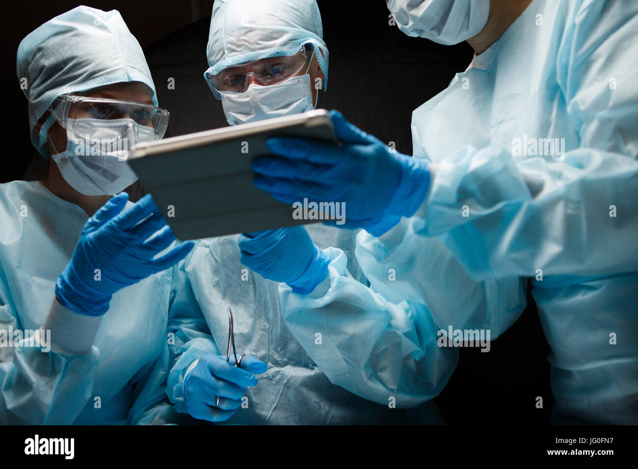 Doctors with computer in hands Stock Photo - Alamy