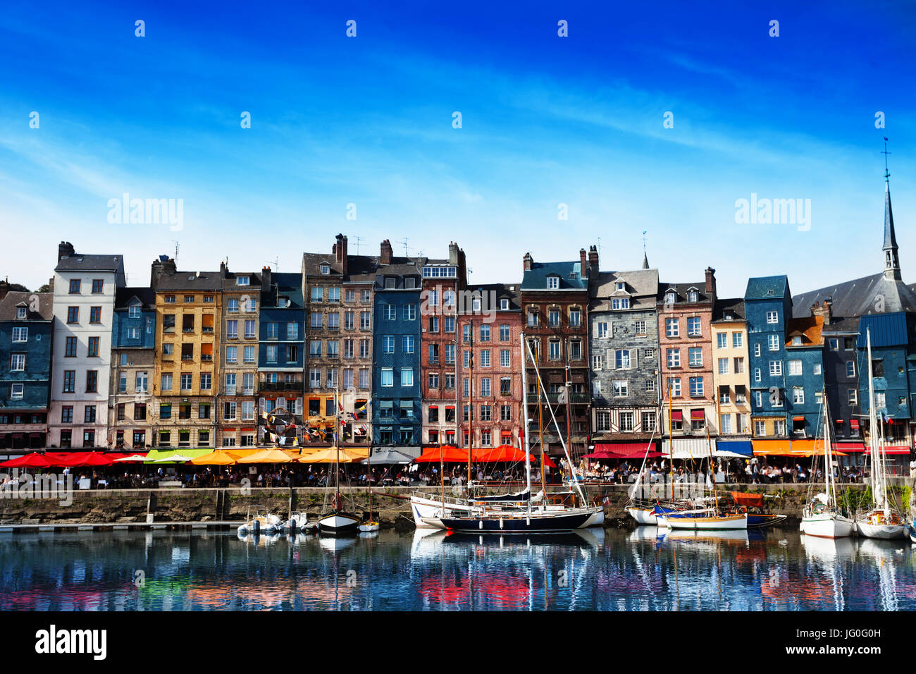 Waterfront of Honfleur harbor with color houses in Normandy, France Stock Photo