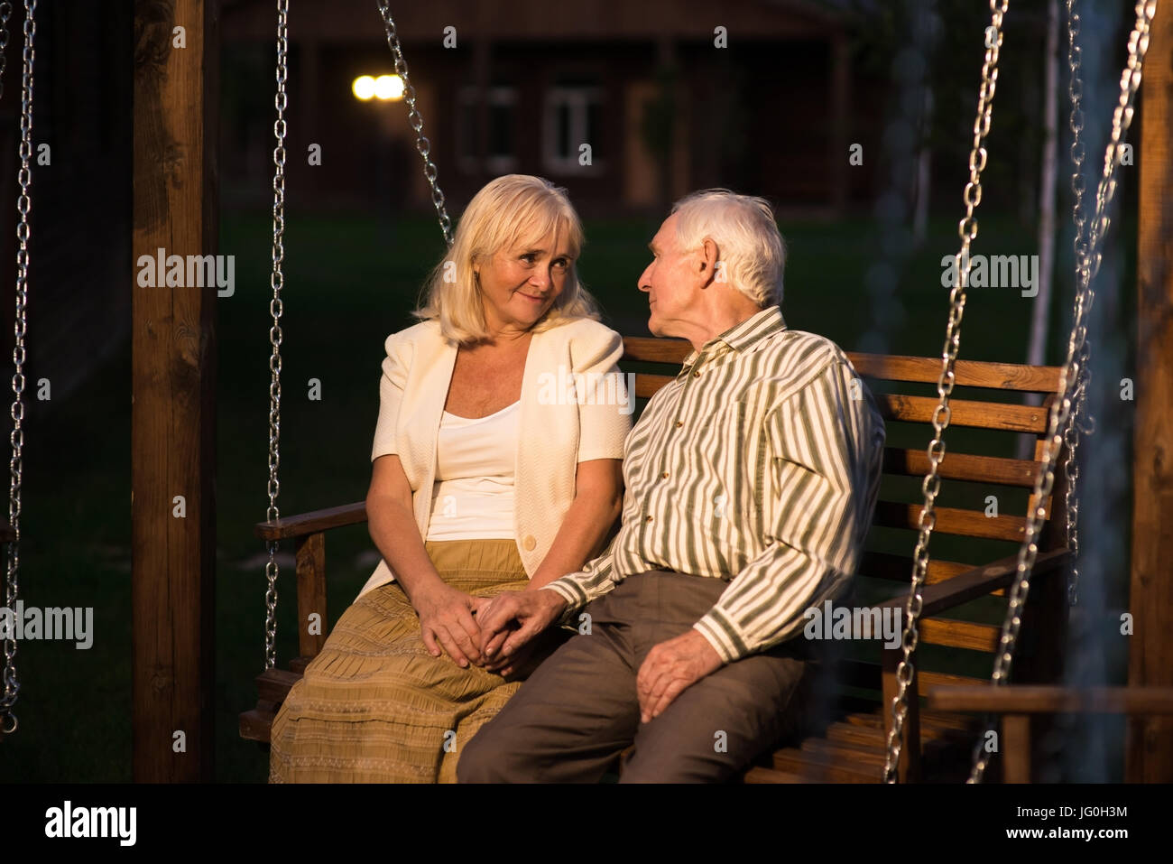 Old lady sitting on porch hi-res stock photography and images - Alamy