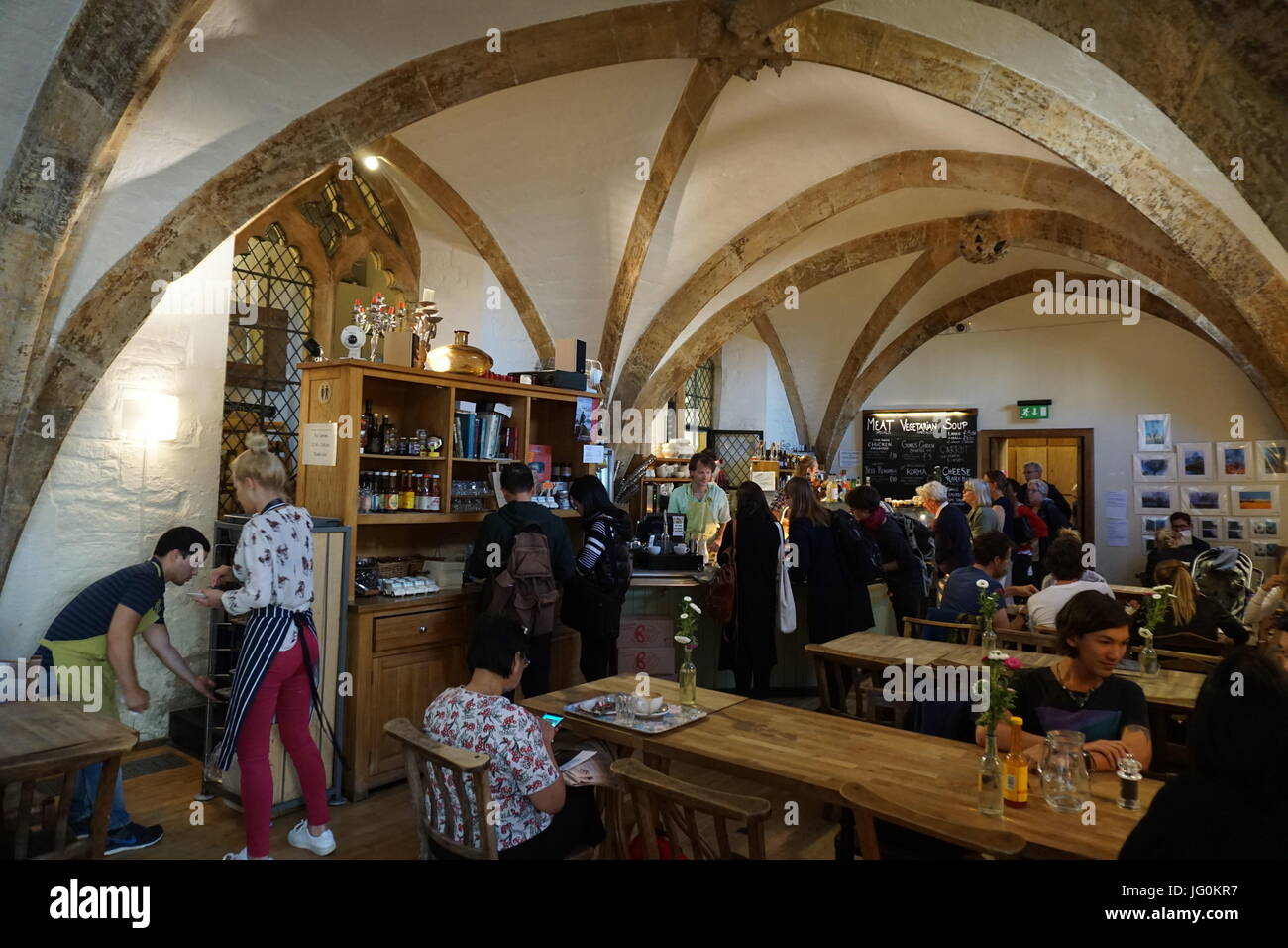 Restaurant in medieval chamber beneath St. Mary's Church Stock Photo